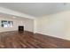 Spacious living room features hardwood floors, neutral walls, fireplace and lots of natural light at 2024 Spring Creek Dr, Durham, NC 27704