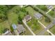 Overhead view of the property showcasing mature landscaping, a large backyard, and neighborhood at 2053 Monthaven Dr, Wake Forest, NC 27587