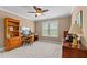 Office featuring carpeting, crown molding, window, and wood furniture at 2053 Monthaven Dr, Wake Forest, NC 27587