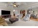 Spacious living room with archways and views into the kitchen and dining areas at 2053 Monthaven Dr, Wake Forest, NC 27587