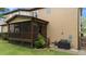 Exterior view of a screened porch with access from the yard at 2053 Monthaven Dr, Wake Forest, NC 27587