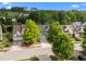 Aerial view of a neighborhood with mature trees, well-maintained lawns, and diverse home styles at 209 Oswego Ct, Morrisville, NC 27560