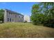 Spacious backyard perfect for outdoor activities and relaxation, featuring a well-manicured lawn at 209 Oswego Ct, Morrisville, NC 27560