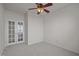 Bedroom with carpet, doors and ceiling fan at 209 Oswego Ct, Morrisville, NC 27560