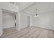 Dining room featuring decorative molding, trey ceiling and wood laminate flooring at 209 Oswego Ct, Morrisville, NC 27560