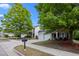 Two-story home with double garage, charming curb appeal, and mature landscaping at 209 Oswego Ct, Morrisville, NC 27560