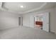 Large main bedroom with entry to bathroom with double sinks and large tub at 209 Oswego Ct, Morrisville, NC 27560