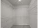 Spacious walk-in closet with multiple levels of wire shelving at 209 Oswego Ct, Morrisville, NC 27560