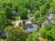 Beautiful home situated on a large, wooded lot in a serene and private setting at 210 Highlands Lake Dr, Cary, NC 27518