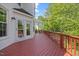 Enjoy the beauty of nature from the deck, perfect for outdoor relaxation and entertaining at 210 Highlands Lake Dr, Cary, NC 27518