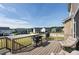 Large wooden back deck with outdoor grill and comfortable seating perfect for entertaining guests at 213 North Crest Dr, Chapel Hill, NC 27517