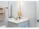 Bathroom features a vanity with a white countertop and brushed nickel faucet with a decorative plant at 213 North Crest Dr, Chapel Hill, NC 27517