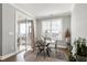 Cozy breakfast nook bathed in natural light with sliding door access to outdoor living space at 213 North Crest Dr, Chapel Hill, NC 27517