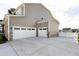 Spacious three car garage with carriage doors offers ample parking at 213 North Crest Dr, Chapel Hill, NC 27517