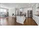 Bright, open kitchen boasts a large island, stainless appliances, and ample storage space at 213 North Crest Dr, Chapel Hill, NC 27517