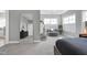Bright main bedroom features a sitting area, a large mirror, and access to the main bathroom at 213 North Crest Dr, Chapel Hill, NC 27517