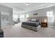 Spacious main bedroom featuring a king bed, sitting area, and ample natural light at 213 North Crest Dr, Chapel Hill, NC 27517