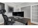 Well-lit home office with a large desk featuring dual monitors, comfortable ergonomic chair, and stylish decor at 213 North Crest Dr, Chapel Hill, NC 27517