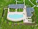 An aerial view showcasing the pool area with lounge chairs, tables, and well-maintained landscaping at 213 North Crest Dr, Chapel Hill, NC 27517