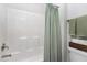 Shower with a white surround and nickel fixtures and a shower curtain at 213 North Crest Dr, Chapel Hill, NC 27517