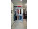 Custom walk-in closet provides ample storage with built-in shelving, rods, and drawers at 213 North Crest Dr, Chapel Hill, NC 27517