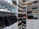 This walk-in closet boasts custom shelving for shoes and handbags for ultimate organization at 213 North Crest Dr, Chapel Hill, NC 27517