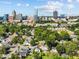An aerial view showing the property's neighborhood and proximity to the city skyline at 215 Haywood St, Raleigh, NC 27601
