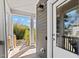 Cozy porch with durable siding and framed view to backyard and white door frame at 215 Haywood St, Raleigh, NC 27601