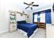 Bedroom features a built-in bookcase headboard with shelves and built-in drawers at 226 Marshview Cir, Angier, NC 27501