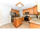 Well-equipped kitchen featuring stainless steel appliances, granite countertops, and ample cabinet space at 226 Marshview Cir, Angier, NC 27501