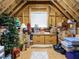 Attic storage area full of boxes, furniture, and decor, showcasing great organizational potential at 2317 Emerald Woods Dr, Wake Forest, NC 27587