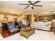 Spacious living room with hardwood floors and an open layout connecting to the kitchen and dining areas at 2317 Emerald Woods Dr, Wake Forest, NC 27587