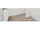 Hallway featuring neutral carpet and white baseboards, showcasing clean and simple design elements at 2418 Mont Haven Dr, Durham, NC 27712