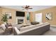 Inviting living room features a cozy fireplace, plush seating, and plenty of natural light at 2418 Mont Haven Dr, Durham, NC 27712