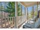 Covered porch with seating, ideal for enjoying the outdoor scenery at 2418 Mont Haven Dr, Durham, NC 27712