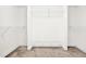 A walk in closet with installed metal racks at 2418 Mont Haven Dr, Durham, NC 27712