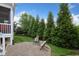 Secluded backyard patio with comfortable seating and verdant landscaping, creating a serene outdoor retreat at 2709 Sardinia Ln, Apex, NC 27502