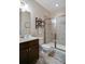 This bathroom features a modern vanity, sleek shower, and stylish fixtures for a spa-like experience at 2709 Sardinia Ln, Apex, NC 27502