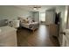 Bright bedroom with toys and hardwood style floors at 2709 Sardinia Ln, Apex, NC 27502