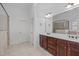 The primary bath is complete with double vanity, ceramic tile flooring, and a private water closet at 2832 Cameron Pond Dr, Cary, NC 27519