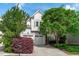 Charming home with a two-car garage, mature trees, and a well-manicured lawn at 2832 Cameron Pond Dr, Cary, NC 27519