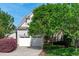 Charming two-story home with a two-car garage, mature trees, and landscaped front yard at 2832 Cameron Pond Dr, Cary, NC 27519