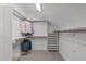 This walk-in closet is equipped with built-in shelving and hanging racks for optimal storage and organization at 2832 Cameron Pond Dr, Cary, NC 27519