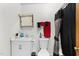 Bathroom with a white vanity and mirror, a toilet, and a shower with a dark shower curtain at 3016 Fields Dr, Raleigh, NC 27603