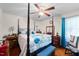 Cozy main bedroom featuring a four-poster bed, soft lighting, and ample space at 3016 Fields Dr, Raleigh, NC 27603