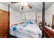 Spacious main bedroom featuring a four-poster bed, soft lighting, and ample space at 3016 Fields Dr, Raleigh, NC 27603