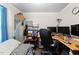 Bedroom also serving as an office with a day bed and an office set-up with monitors at 3016 Fields Dr, Raleigh, NC 27603