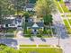 Aerial view of a charming home with a well-manicured front yard and traditional architectural details at 302 N Sumner St, Selma, NC 27576