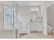 Bathroom with walk-in tub, glass-enclosed shower, and white vanity at 308 Ravenstone Dr, Cary, NC 27518