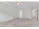 Large bedroom features carpeted floors and tray ceiling at 308 Ravenstone Dr, Cary, NC 27518